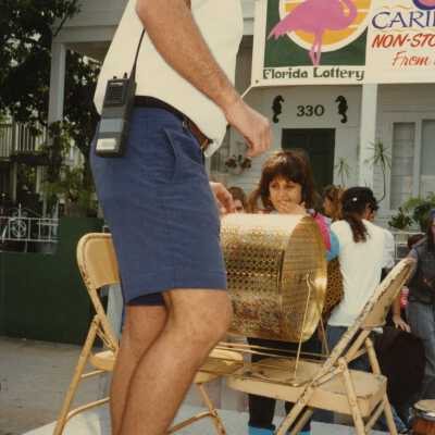 An unknown man on a stage.