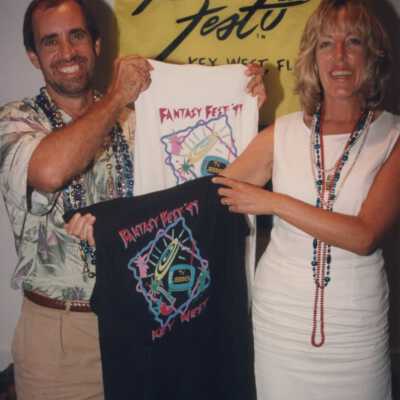 Unknown people holding up FF t shirts at the award ceremony.