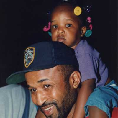 Unknown man and little girl at the Goombay celebration.