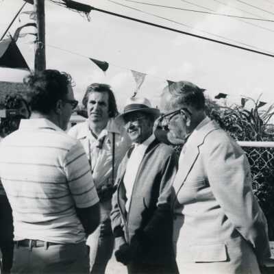 Unknown people talking at a ceremony
