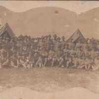 Group of soldiers in front of tents