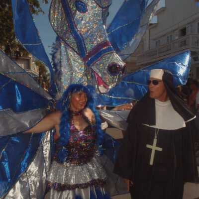 Unknown people dressed up.