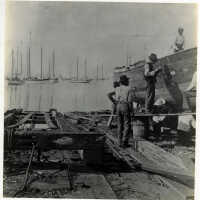Caulking a Sponge Boat at Key West