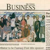          An article in the Key West Citizen about Fantasy Fest that reads Distributo
   