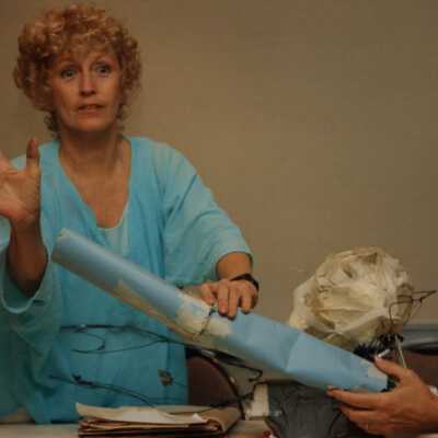 Unknown woman talking at the Coors light parade workshop.