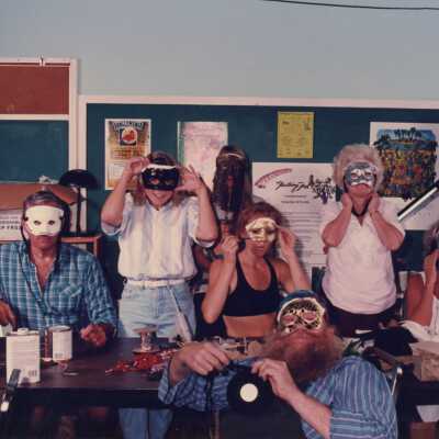 Unknown people making face masks.