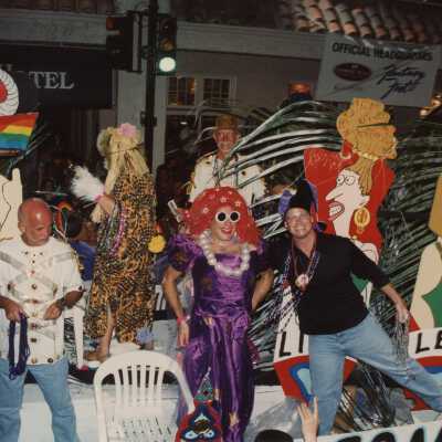 Unknown people dressed up on a float.