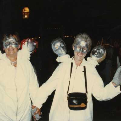 Two unknown woman dressed up.