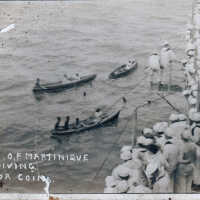 Natives of Martinique diving for coins