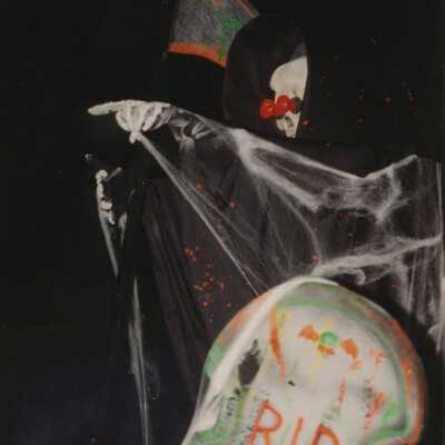 Unknown person dressed up on a float.