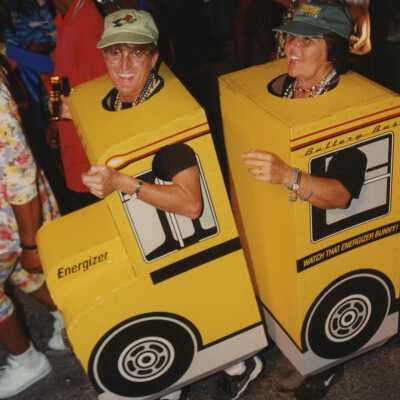 Two unknown people dressed up.