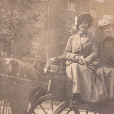 Unknown women in a horse-drawn carriage