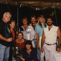 A group of unknown people at a ceremony.
