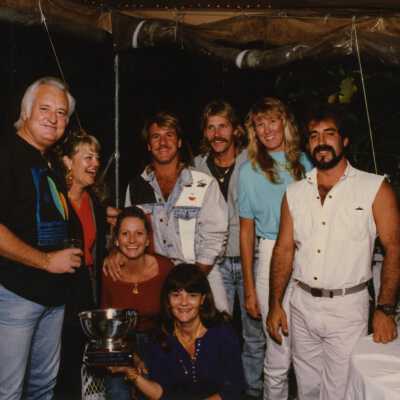 A group of unknown people at a ceremony.