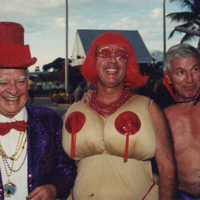 Three Unknown people dressed up.