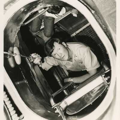 U.S. Navy man working on a ship