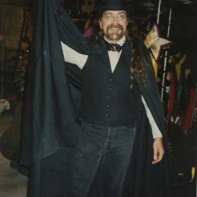 An unknown man dressed up.