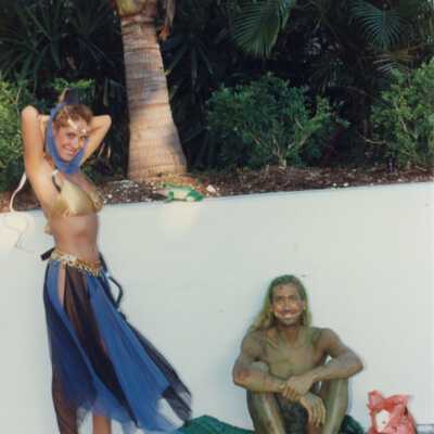 Unknown people dressed up.