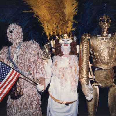 Unknown people dressed up in the parade.