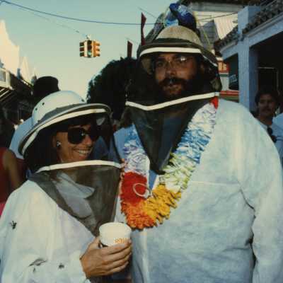 Two unknown people dressed up.