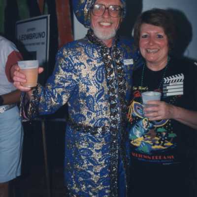 Unknown man dressed up with an unknown woman.