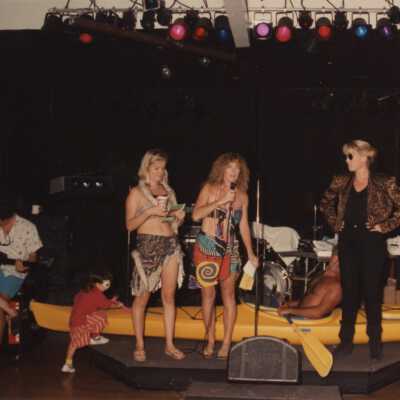 Unknown people on a stage.