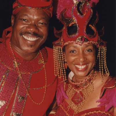 Two unknown people dressed up.