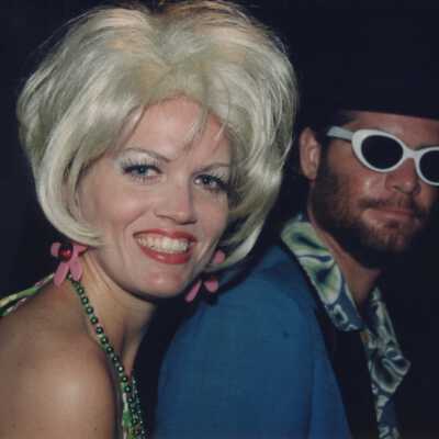 Unknown couple dressed up.