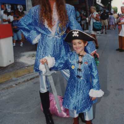 Unknown woman and child dressed up.