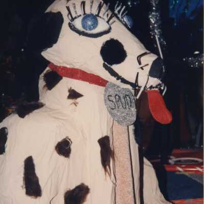 A float that is a dog that reads spud.