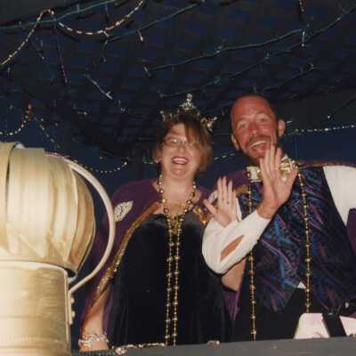 Fantasy Fest queen and king on a float.
