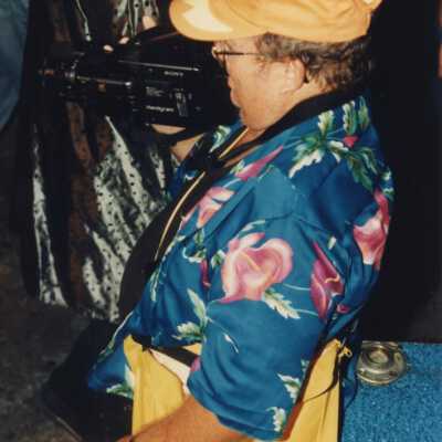 Unknown man with a video camera.