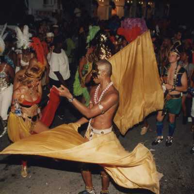 Unknown people walking in the parade.