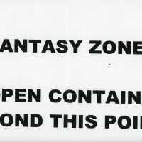 A sign that reads Fantasy zone. No open containers beyond this point.