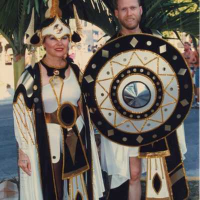 Two unknown people dressed up.