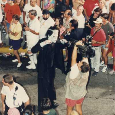 An unknown man dressed up walking down Duval Street during the parade.
