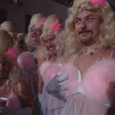 Unknown people dressed up.