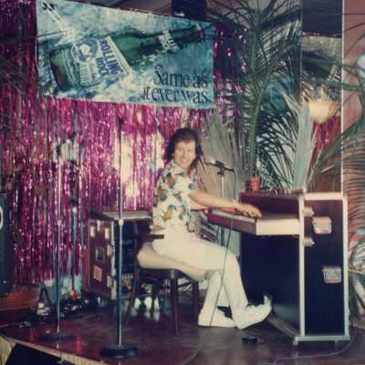 Unknown person playing the piano.