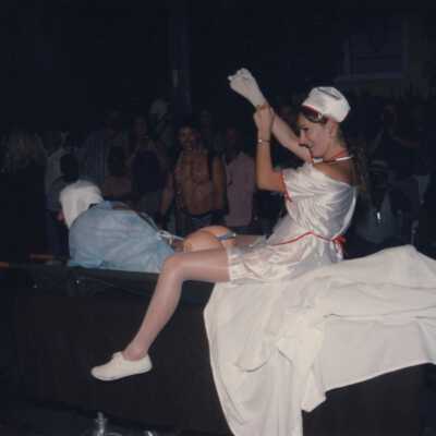 Unknown people dressed up on a float.