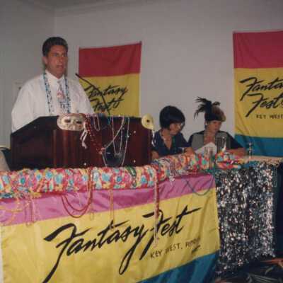 Unknown man speaking at the award ceremony.