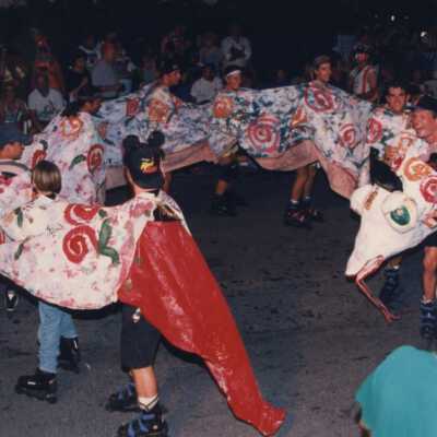 Unknown people roller blading during the parade.