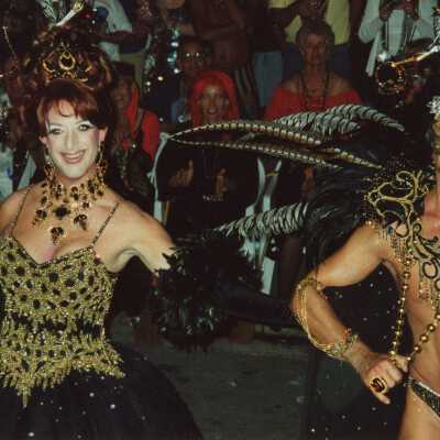 Two unknown people dressed up in the parade.
