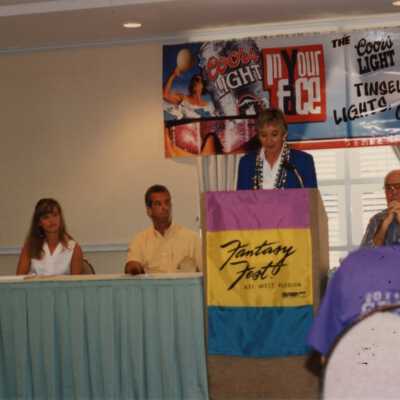 Unknown lady talking at the Fantasy Fest meeting.