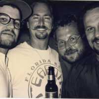 Four unknown men.