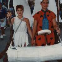 An unknown couple dressed up like Fred and Wilma Flintstone.