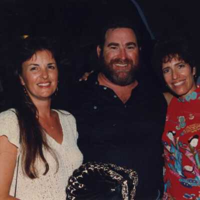 Rita Troxel and an unknown couple with an award at the awards ceremony.
