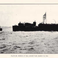 The USS MAINE being towed from Havana Harbor