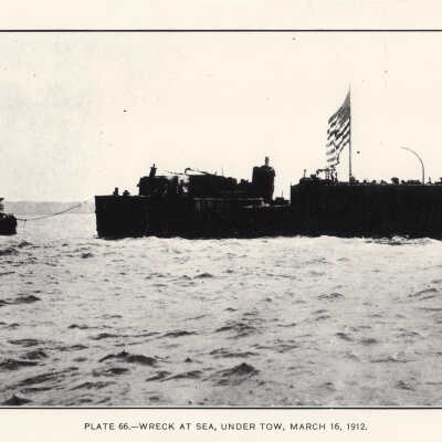 The U.S.S. MAINE being towed from Havana Harbor