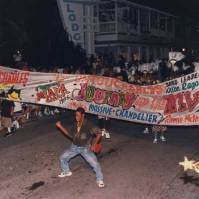 The Untouchables sign in the parade.