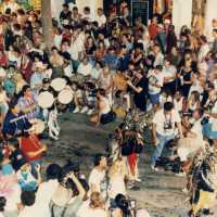 A group of people in the street during the parade.